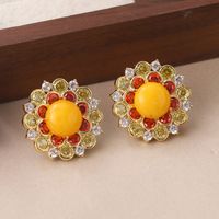 1 Pair Simple Style Sun Flower Inlay Copper Natural Stone Zircon Ear Studs main image 5