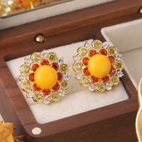 1 Pair Simple Style Sun Flower Inlay Copper Natural Stone Zircon Ear Studs main image 1