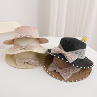 Women's Simple Style Solid Color Bowknot Wide Eaves Straw Hat main image 3