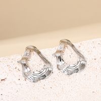 1 Pair Elegant Retro Exaggerated Irregular Pleated Hollow Out Alloy Ear Studs main image 7