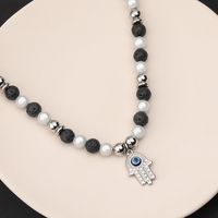 304 Stainless Steel Casual Simple Style Classic Style Beaded Devil's Eye Palm Pendant Necklace main image 1
