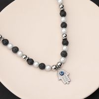 304 Stainless Steel Casual Simple Style Classic Style Beaded Devil's Eye Palm Pendant Necklace main image 10