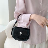 Women's Medium Pu Leather Solid Color Elegant Oval Flip Cover Shoulder Bag main image 4