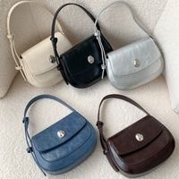 Women's Medium Pu Leather Solid Color Elegant Oval Flip Cover Shoulder Bag main image video