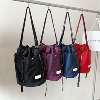 Women's Nylon Solid Color Streetwear Oval String Shoulder Bag main image 4