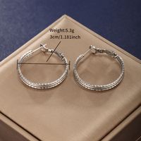 1 Pair XUPING Simple Style Circle 304 Stainless Steel Hoop Earrings main image 9