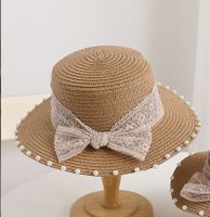 Women's Simple Style Solid Color Bowknot Wide Eaves Straw Hat sku image 1