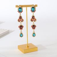 1 Pair Simple Style Shiny Oval Water Droplets Inlay Alloy Glass Gold Plated Drop Earrings main image 1