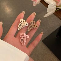 Women's Sweet Bow Knot Alloy Spray Paint Plating Hollow Out Hair Claws main image 2