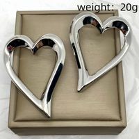 1 Pair Simple Style Solid Color Geometric Heart Shape Copper Ear Studs main image 7