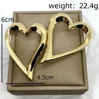 1 Pair Simple Style Solid Color Geometric Heart Shape Copper Ear Studs main image 6