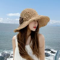 Women's Vacation Beach Simple Style Solid Color Flower Big Eaves Sun Hat Straw Hat main image 1