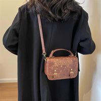 Women's Pu Leather Solid Color Classic Style Sewing Thread Square Flip Cover Shoulder Bag main image 1