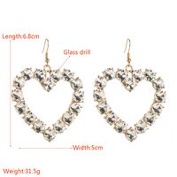 1 Pair Vacation Simple Style Classic Style Heart Shape Hollow Out Inlay Alloy Glass Gold Plated Drop Earrings main image 2