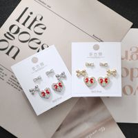 1 Set Simple Style Heart Shape Bow Knot Plating Inlay Copper Zircon Ear Studs main image 1