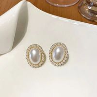 Simple Style Heart Shape Flower Bow Knot Imitation Pearl Alloy Rhinestone Irregular Women's Earrings 1 Pair sku image 59