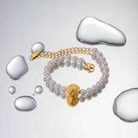 Großhandel Schmuck IG-Stil Blume Edelstahl 304 Künstliche Perle Titan Stahl 18 Karat Vergoldet Armbänder main image 4