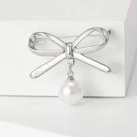 Élégant Style Simple Noeud D'arc Alliage Placage Incruster Perles Artificielles Femmes Broches main image 5