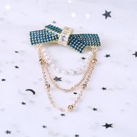 Elegant Glam Bow Knot Alloy Tassel Plating Inlay Artificial Pearls Rhinestones Women's Brooches main image 5