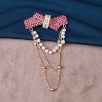 Élégant Glamour Noeud D'arc Alliage Gland Placage Incruster Perles Artificielles Strass Femmes Broches main image 1
