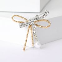 Elegant Glam Bow Knot Alloy Plating Inlay Artificial Pearls Rhinestones Women's Brooches main image 1