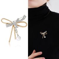 Élégant Glamour Noeud D'arc Alliage Placage Incruster Perles Artificielles Strass Femmes Broches main image 3