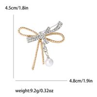 Elegant Glam Bogenknoten Legierung Überzug Inlay Künstliche Perlen Strasssteine Frau Broschen sku image 1