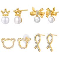 1 Pair Sweet Crown Bow Knot Plating Inlay Copper Alloy Artificial Pearls Zircon Ear Studs main image 1