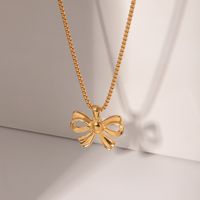Stainless Steel IG Style Elegant Bow Knot Plating Inlay Artificial Pearls Pendant Necklace main image 5