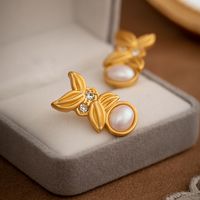 1 Pair Glam Retro Leaves Plating Inlay Copper Artificial Pearls Zircon Ear Studs main image 3