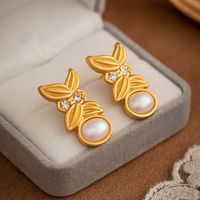 1 Pair Glam Retro Leaves Plating Inlay Copper Artificial Pearls Zircon Ear Studs main image 1