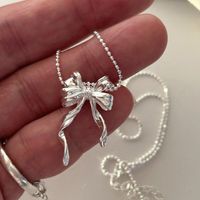 Sterling Silver Simple Style Bow Knot Plating Pendant Necklace main image 5