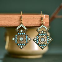 1 Pair Ethnic Style Sun Alloy Plating Inlay Beads Women's Drop Earrings sku image 9