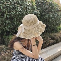 Women's Simple Style Plaid Bowknot Flat Eaves Straw Hat main image 1