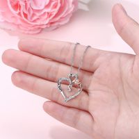 304 Stainless Steel Copper Elegant Simple Style Hollow Out Inlay Letter Heart Shape Rose Zircon Pendant Necklace main image 3