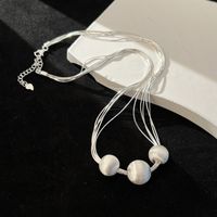 Simple Style Solid Color Artificial Pearl Copper Beaded Plating Silver Plated Unisex Necklace main image 1