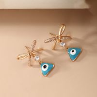 1 Pair Vintage Style Xuping Triangle Bow Knot Irregular Plating Inlay Alloy Copper Alloy Artificial Gemstones 18k Gold Plated Drop Earrings main image 4