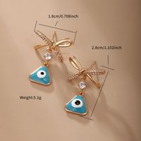 1 Pair Vintage Style Xuping Triangle Bow Knot Irregular Plating Inlay Alloy Copper Alloy Artificial Gemstones 18k Gold Plated Drop Earrings main image 2
