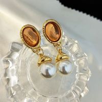 1 Pair Retro Oval Plating Inlay Metal Glass Pearl Drop Earrings main image 4