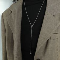 Casual Simple Style Knot Titanium Steel Plating Metal Button Sweater Chain main image 4