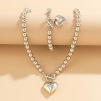 Einfacher Stil Herzform Imitationsperle Kupfer Frau Armbänder Halskette main image 3