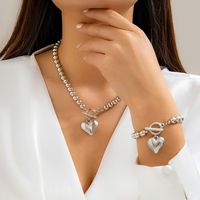 Einfacher Stil Herzform Imitationsperle Kupfer Frau Armbänder Halskette main image 1