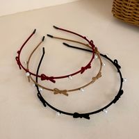 Women's Cute Bow Knot Flannel Suede Inlay Artificial Pearls Hair Band main image 4