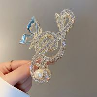 Mujeres Elegante Notas Aleación Enchapado Embutido Perlas Artificiales Diamantes De Imitación Garras De Pelo sku image 1