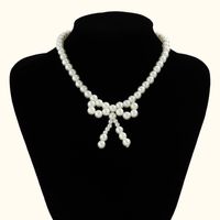 Estilo Moderno Dulce Brillante Nudo De Lazo Con Cuentas Perla De Imitación Con Cuentas Tejido De Punto Mujeres Collar sku image 1