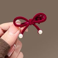Women's Cute Sweet Bow Knot Flannel Flocking Inlay Artificial Pearls Hair Clip main image 4