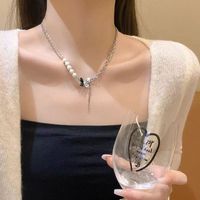 Collares Colgantes De Aleación De Perlas De Mariposa Con Forma De Corazón De Moda Para Mujer sku image 8