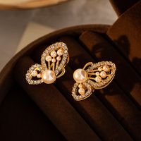 1 Pair Elegant Retro Sweet Butterfly Plating Inlay Copper Artificial Pearls Rhinestones 18k Gold Plated Ear Studs main image 5