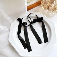1 Pair Casual Simple Style Bow Knot Cloth Metal Earrings main image 1