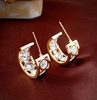 1 Pair Vintage Style Simple Style C Shape Plating Hollow Out Inlay Copper Zircon 14k Gold Plated Ear Studs main image 3